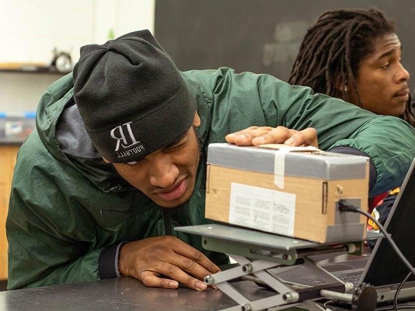 A student works on a research physics project